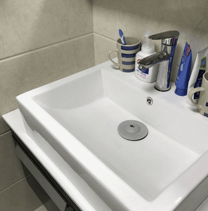 Dual Purpose Drain Stop and Hair Catcher - DMC Wholesale